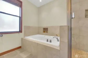 Deep jetted tub for relaxing at the end of a long day.