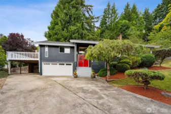 Split level home with carport, extra long driveway, 2 car garage