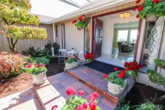 Your guests will be greeted with this charming courtyard and impressive double doors