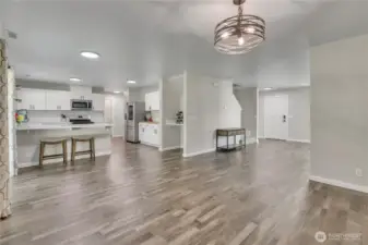 Dining room looking into the kitchen and family room.