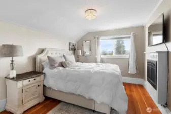 Primary bedroom filled with natural light
