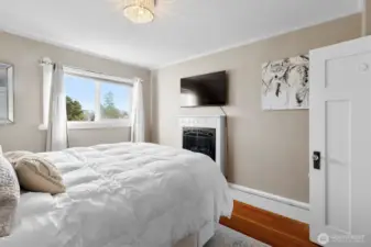 Spacious primary bedroom with classic character