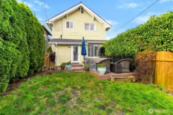 Fenced yard ideal for gatherings, pets, or play