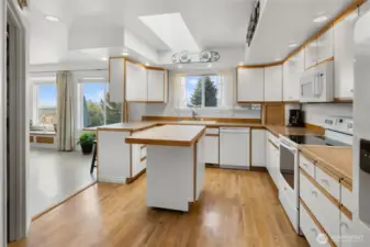 Kitchen has tons of storage and light with under cabinet lighting too!