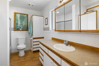 Full size guest bedroom also features TONS of cabinets for the ultimate storage!