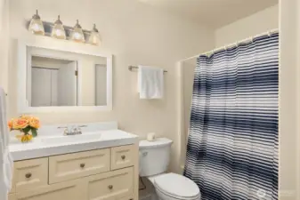 Main floor bathroom with cozy heated floors.
