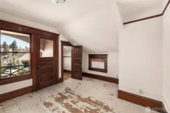 Second bedroom with walk-in closet and door to patio