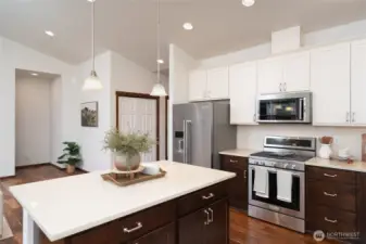 Vaulted ceilings and open floor concept create a spacious feel