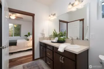 Bright double vanity bathroom with storage