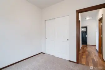 Bedroom with closet and hallway view
