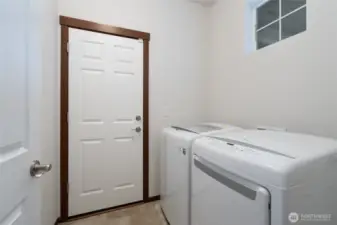 Laundry room with washer and dryer