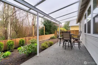 Covered patio with outdoor dining space
