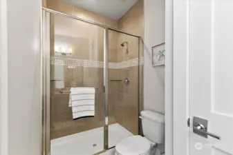 Separate shower in the guest bath.