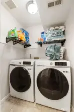 Laundry room with newer Washer and Dryer staying