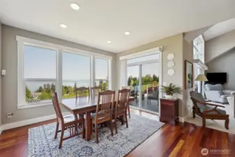 The dining room opens to the deck and the kitchen; an entertainer's dream!