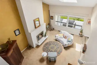 Here you are in the primary suite loft looking down onto the living room.