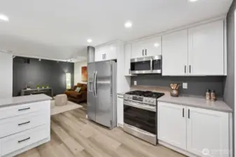 You are in the kitchen looking into the bonus space.