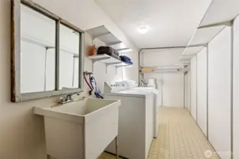 The laundry room is located inside the same door that leads to the double garage.