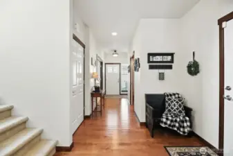 Entry hall that leads to second floor loft and 2 additional bedrooms for guests or craft room space