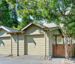 With alley access and space for one car, this garage doubled as a gym and playspace—complete with a wooden Swedish ladder wall set the sellers are happy to leave behind. A man door connects directly to the backyard for easy access.