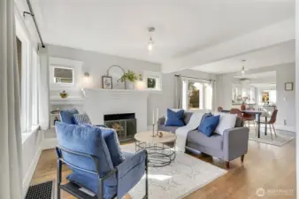 The living room is bright and inviting. Lots of big windows really brighten to room.