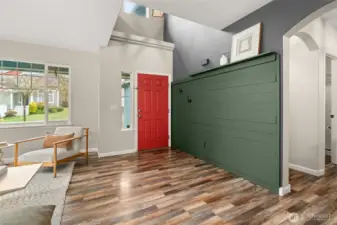 Entry with vaulted ceilings to second floor.