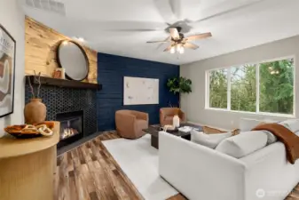 The family room is located off the kitchen and great for relaxing, entertaining, and more.