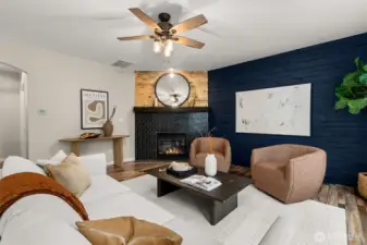 The family room is located off the kitchen and great for relaxing, entertaining, and more.