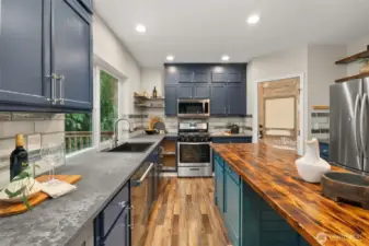 Granite countertops with a honed finish complete this custom look.