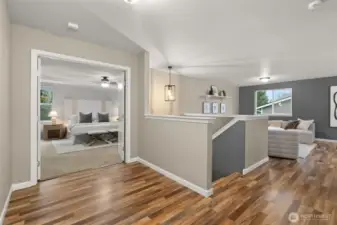 The 2nd story hosts all 4 bedrooms, a bonus room with additional desks.