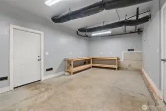 The additional 480 square feet of unfinished square footage is accessed by using the exterior stairs or side yards. This workspace includes a 220W and has been used as a workspace for the current and former owners.