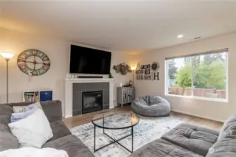 Gas fireplace compliments this open living space