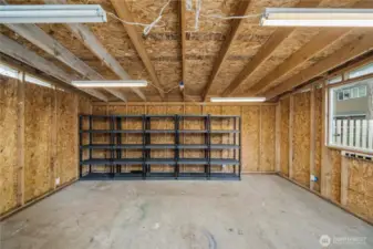 Inside of shed.  Very spacious, equipped with electricity and heat.