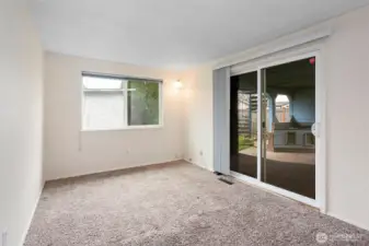 Primary bedroom with Slider to covered patio