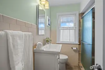 Updated main bath,gorgeous tiled walk in shower. ADA compliant