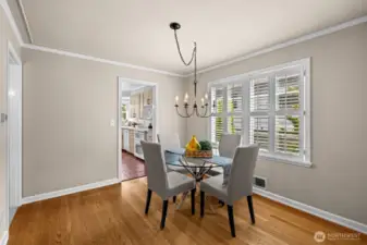 Spacious dining room leads to kitchen