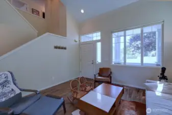 Living room with vaulted ceilings opens up the space!
