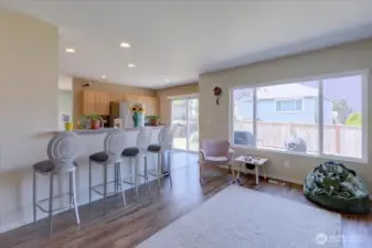 From the family room towards the kitchen and eating bar.