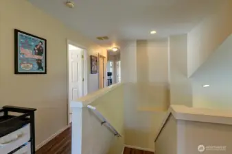 Looking down the hall towards the other bedrooms.
