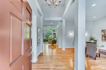 Enter on to hardwood floors and notice the freshly painted interior.