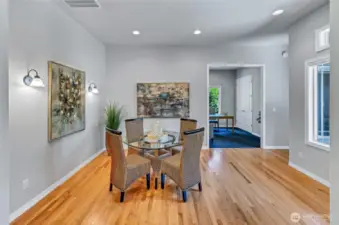 Off the entry is the dining area with the office/den straight ahead and second bedroom suite to the right.