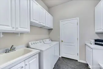 The washer and dryer are included with the home. Handy laundry sink and lots of storage.