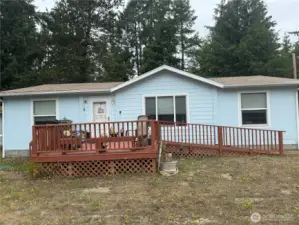 Large front deck to enjoy with a ramp for easy access.