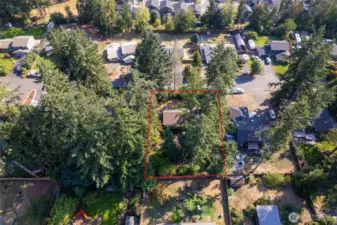 A different aerial view of home and property.