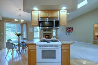 Island with stove, microwave and cabinetry