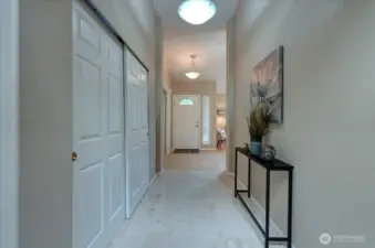 Hallway with coat closet