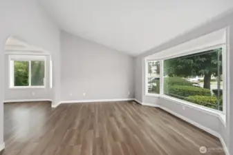 Another view of the front room, empty.