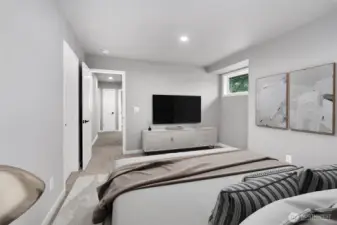 Gigantic primary bedroom, with a huge walk-in closet.