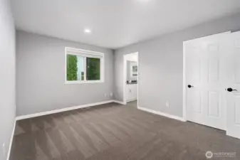 Another view of the primary bedroom.