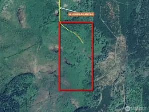 Overhead view with approximate boundaries in red with road and access in yellow.